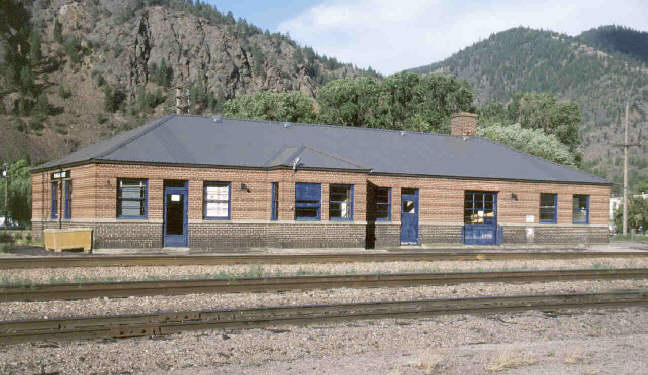 Paradise, Montana NP depot, brick structure with blue trim. 640 x 375